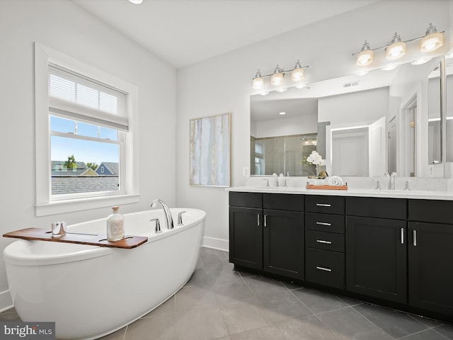 11412 Dairy St, Fulton, MD 20759 - bathroom with a shower stall, double vanity, tile patterned floors, and a soaking tub