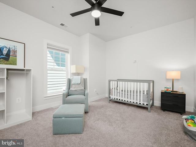 11412 Dairy St, Fulton, MD 20759 - carpeted bedroom featuring a crib and a ceiling fan