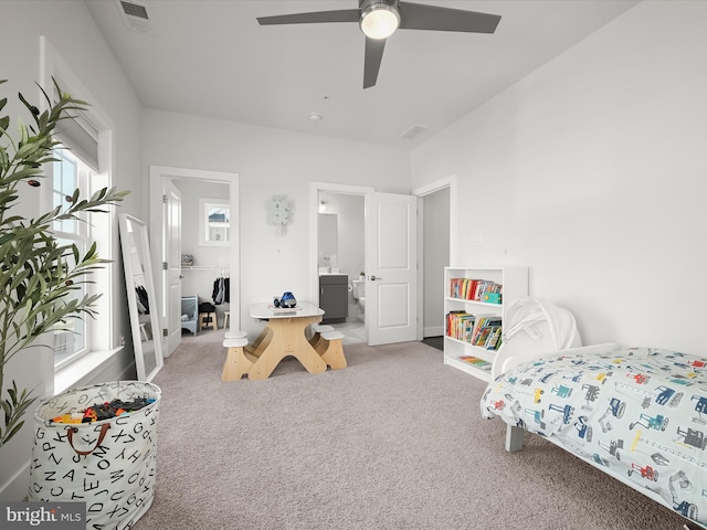 11412 Dairy St, Fulton, MD 20759 - carpeted bedroom with multiple windows, ensuite bathroom, and a ceiling fan