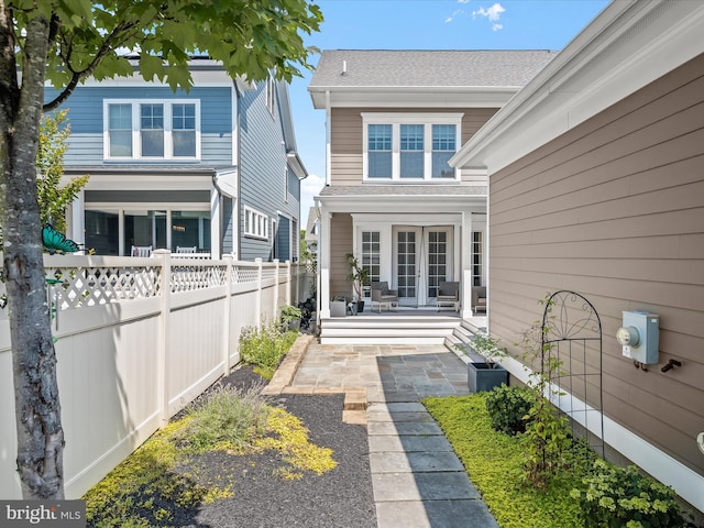 11412 Dairy St, Fulton, MD 20759 - rear view of house featuring french doors, a patio area, and roof with shingles