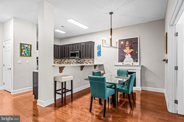605 N Atlantic Ave Unit 104, Collingswood, NJ 08108 - dining room with wood finished floors and a chandelier