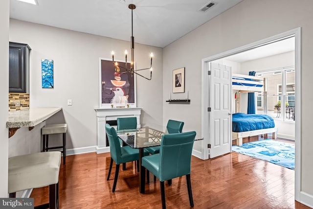 605 N Atlantic Ave Unit 104, Collingswood, NJ 08108 - dining room featuring wood finished floors and a chandelier