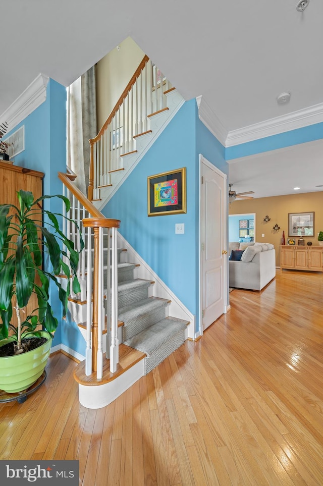 236 Cambridge Pl, Chalfont, PA 18914 - stairs featuring crown molding, hardwood / wood-style flooring, and a ceiling fan