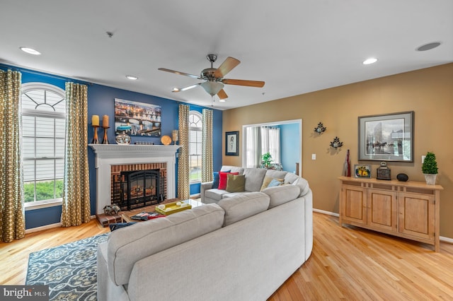 236 Cambridge Pl, Chalfont, PA 18914 - living area with light wood-style floors, a brick fireplace, a ceiling fan, and recessed lighting