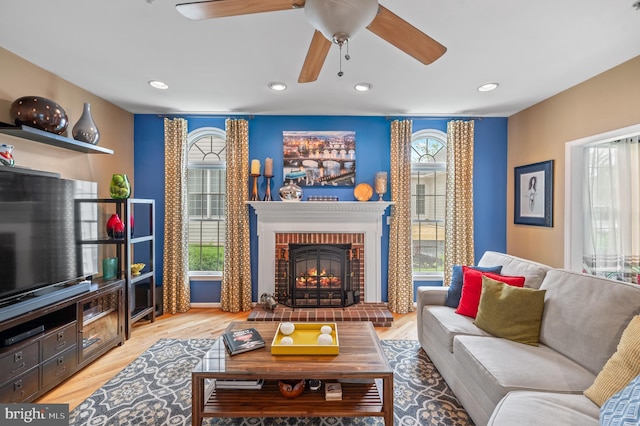 236 Cambridge Pl, Chalfont, PA 18914 - living area featuring recessed lighting, a fireplace, wood finished floors, and a ceiling fan