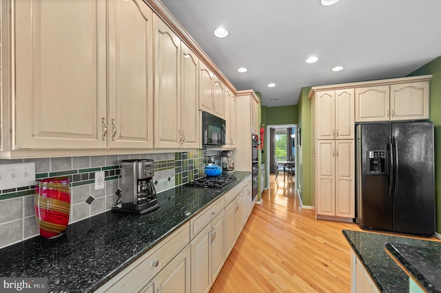 236 Cambridge Pl, Chalfont, PA 18914 - kitchen with black appliances, light wood finished floors, tasteful backsplash, dark stone countertops, and recessed lighting