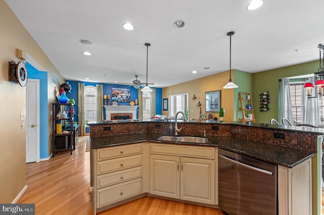 236 Cambridge Pl, Chalfont, PA 18914 - kitchen featuring stainless steel dishwasher, open floor plan, a ceiling fan, light wood-style flooring, and a brick fireplace