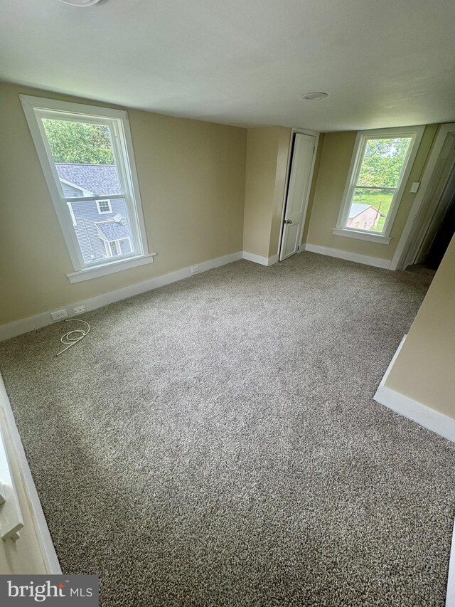 6054 Baltimore Pike, Littlestown, PA 17340 - carpeted empty room with baseboards