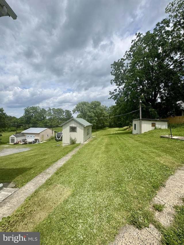 6054 Baltimore Pike, Littlestown, PA 17340 - view of grassy yard featuring an outbuilding