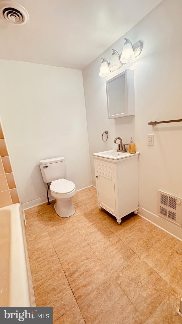 6054 Baltimore Pike, Littlestown, PA 17340 - full bath with vanity, tile patterned floors, and a tub
