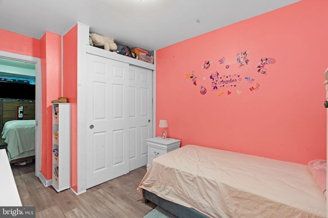 330 N 13th St, Reading, PA 19604 - bedroom featuring light wood finished floors and a closet