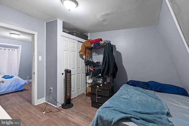330 N 13th St, Reading, PA 19604 - bedroom featuring wood finished floors and a closet