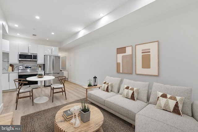 429 20th St NE Unit 1, Washington, DC 20002 - living area with light wood-type flooring and recessed lighting