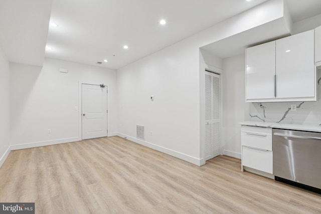 429 20th St NE Unit 1, Washington, DC 20002 - kitchen with dishwasher, light wood-style flooring, white cabinetry, recessed lighting, and light countertops