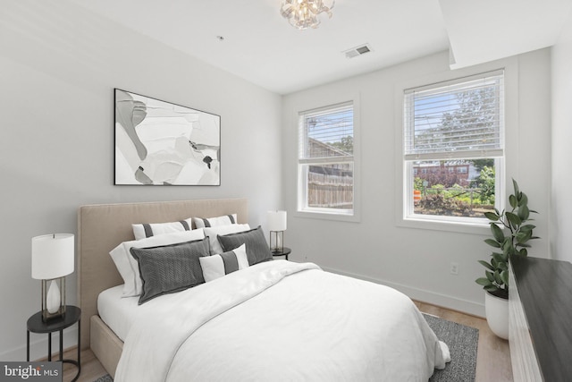429 20th St NE Unit 1, Washington, DC 20002 - bedroom featuring baseboards and wood finished floors