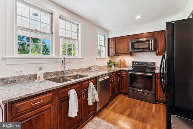 720 E Stephens Ln, Purcellville, VA 20132 - kitchen featuring stainless steel appliances, light wood-style floors, light stone countertops, and recessed lighting
