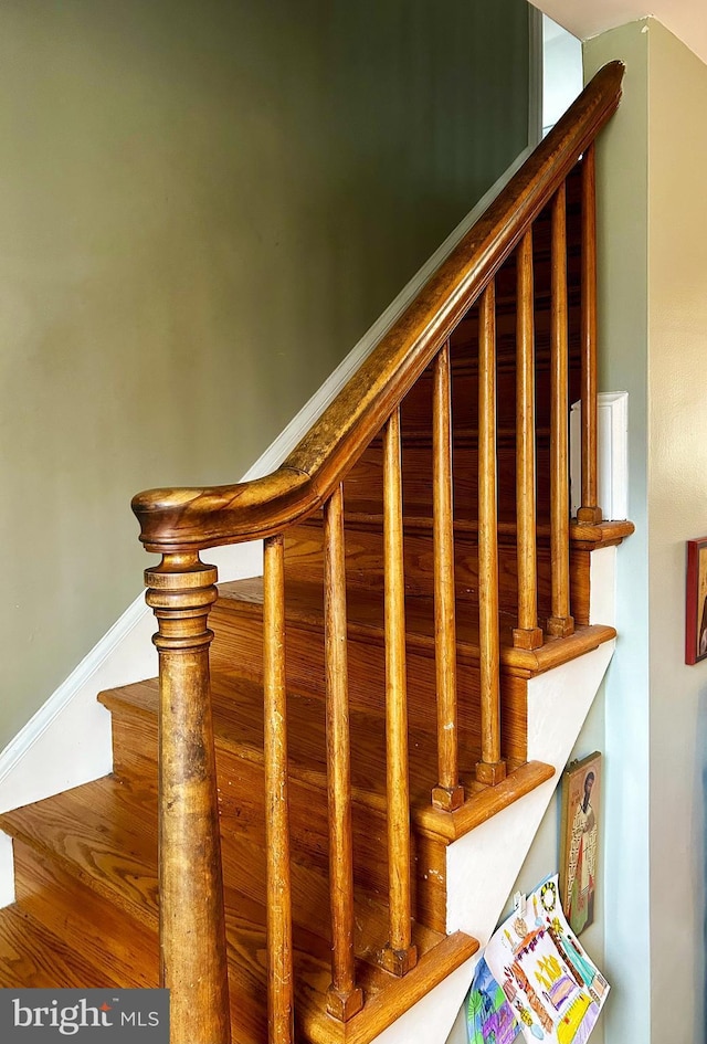 720 E Stephens Ln, Purcellville, VA 20132 - stairway with baseboards and wood finished floors