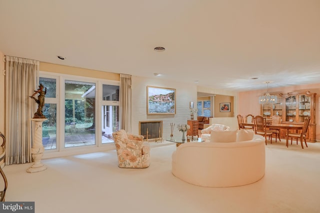7900 Ivy Ln, Baltimore, MD 21208 - carpeted living area with a fireplace and a chandelier