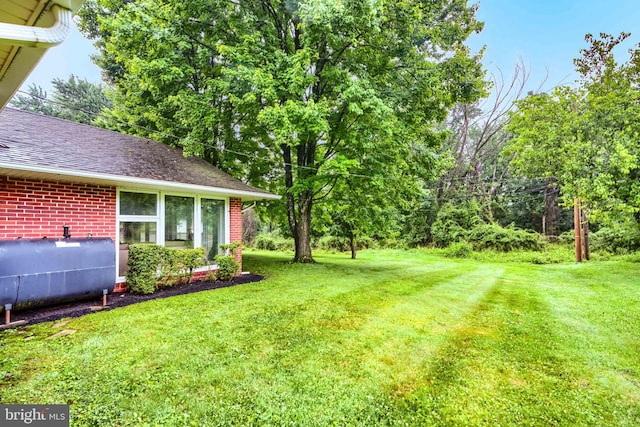 7900 Ivy Ln, Baltimore, MD 21208 - view of green lawn featuring oil tank