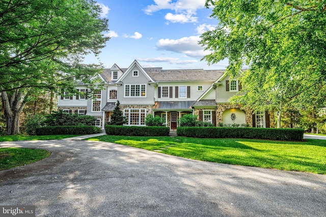 3537 Sawmill Rd, Newtown Square, PA 19073 - view of front facade with stone siding and a front lawn