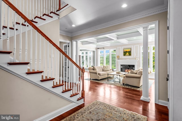 3537 Sawmill Rd, Newtown Square, PA 19073 - stairway featuring decorative columns, ornamental molding, coffered ceiling, wood finished floors, and a glass covered fireplace