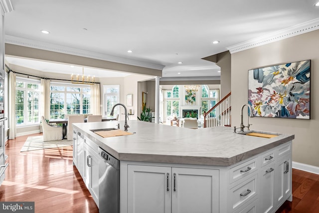 3537 Sawmill Rd, Newtown Square, PA 19073 - kitchen with stainless steel dishwasher, an island with sink, crown molding, wood finished floors, and recessed lighting