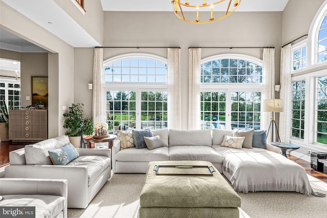 3537 Sawmill Rd, Newtown Square, PA 19073 - sunroom featuring french doors and a chandelier