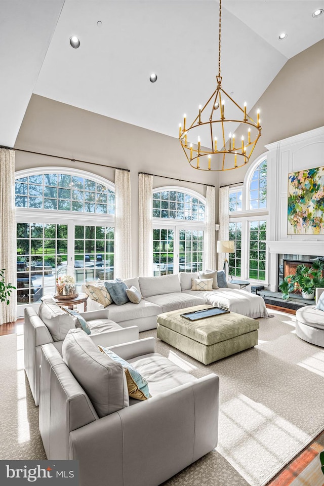 3537 Sawmill Rd, Newtown Square, PA 19073 - living area with high vaulted ceiling, a chandelier, recessed lighting, and a glass covered fireplace