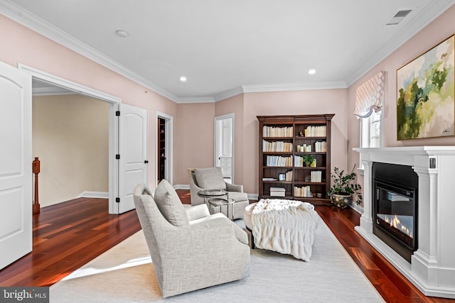 3537 Sawmill Rd, Newtown Square, PA 19073 - living area featuring dark wood-style floors, a glass covered fireplace, recessed lighting, and crown molding