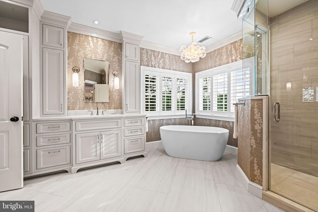 3537 Sawmill Rd, Newtown Square, PA 19073 - bathroom featuring a chandelier, a stall shower, a freestanding tub, vanity, and crown molding