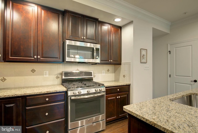 13764 Earhart Cir, Herndon, VA 20171 - kitchen with stainless steel appliances, crown molding, backsplash, light stone countertops, and dark wood-style flooring