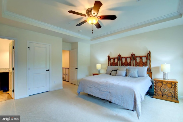 13764 Earhart Cir, Herndon, VA 20171 - bedroom featuring light carpet, ornamental molding, a raised ceiling, connected bathroom, and ceiling fan