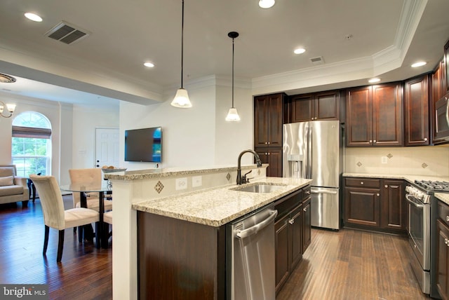 13764 Earhart Cir, Herndon, VA 20171 - kitchen with appliances with stainless steel finishes, ornamental molding, dark wood-style floors, open floor plan, and dark brown cabinetry