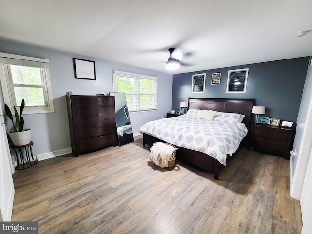 353 Wedgewood Dr, Easton, PA 18045 - bedroom with wood finished floors, multiple windows, and a ceiling fan