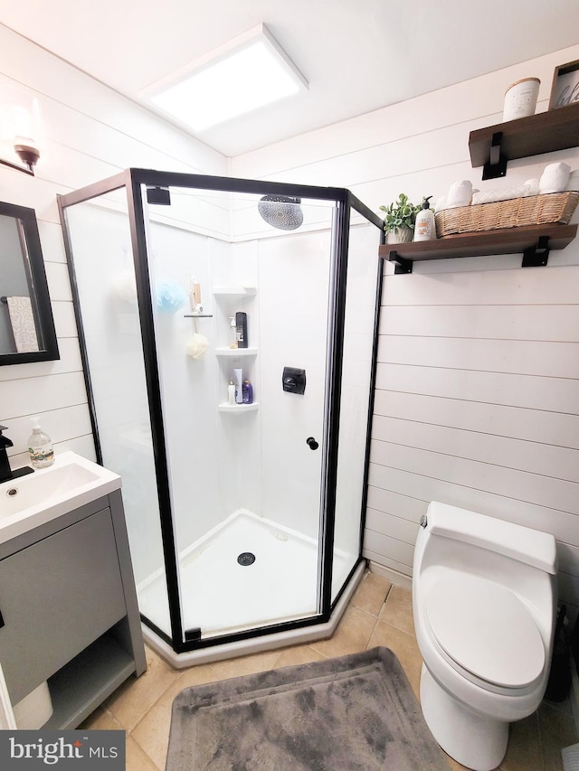 353 Wedgewood Dr, Easton, PA 18045 - full bath featuring a stall shower, tile patterned flooring, vanity, and wooden walls