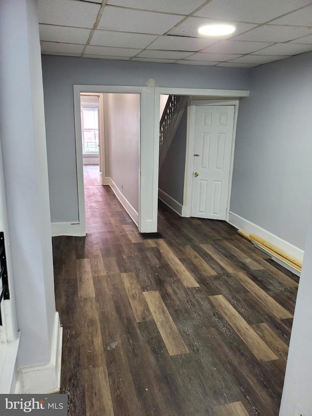 68 End, Trenton, NJ 08618 - spare room featuring a drop ceiling, stairs, and dark wood-style floors