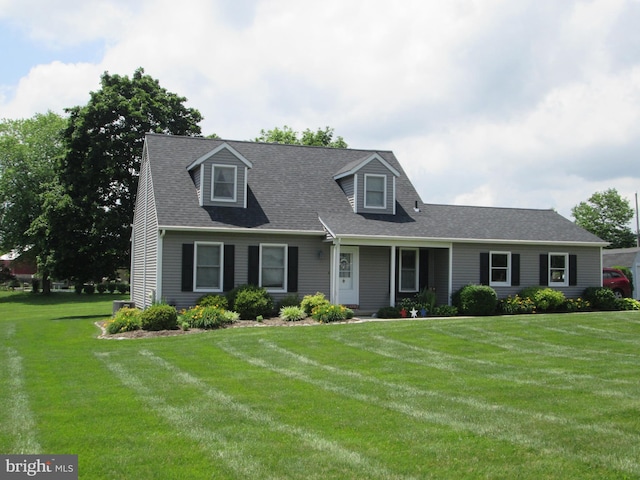 2515 Washington Dr, Gilbertsville, PA 19525 - cape cod-style house with a front lawn and a shingled roof