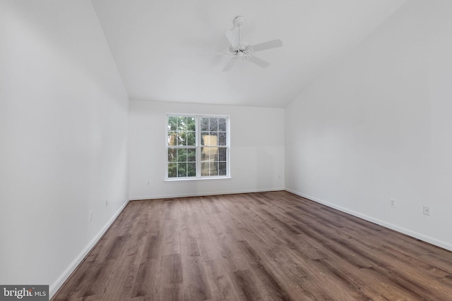 21411 Emerald Dr, Germantown, MD 20876 - spare room featuring lofted ceiling, wood finished floors, and a ceiling fan