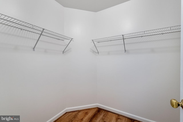 21411 Emerald Dr, Germantown, MD 20876 - spacious closet featuring wood finished floors