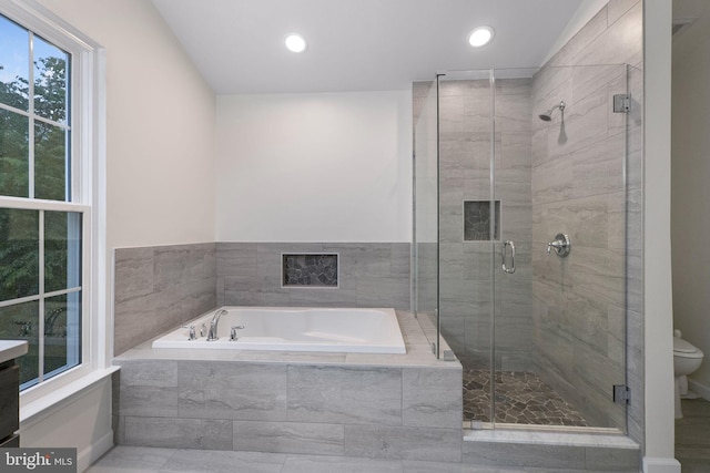 21411 Emerald Dr, Germantown, MD 20876 - bathroom with a bath, a stall shower, and recessed lighting