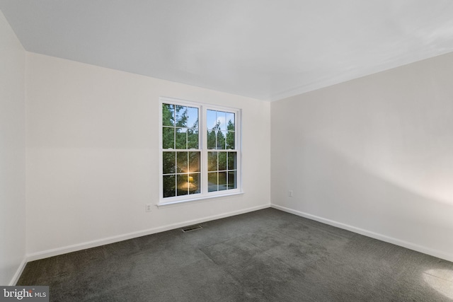 21411 Emerald Dr, Germantown, MD 20876 - spare room featuring dark carpet and baseboards