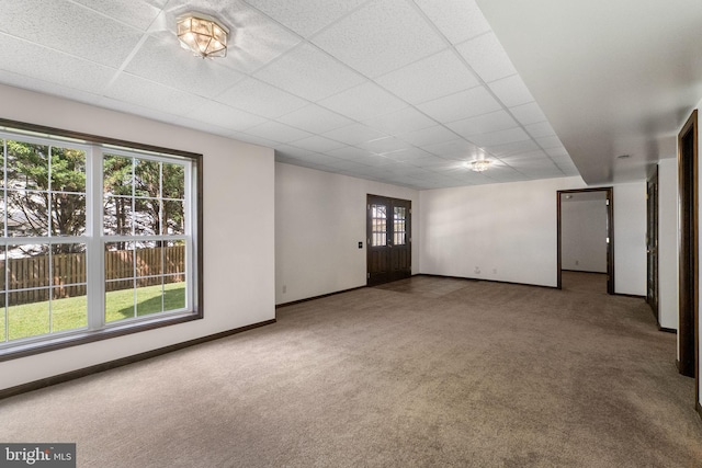 21411 Emerald Dr, Germantown, MD 20876 - unfurnished room with carpet flooring, healthy amount of natural light, and a paneled ceiling