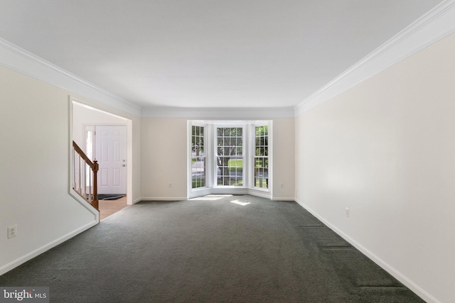 21411 Emerald Dr, Germantown, MD 20876 - spare room featuring crown molding, carpet, and stairway