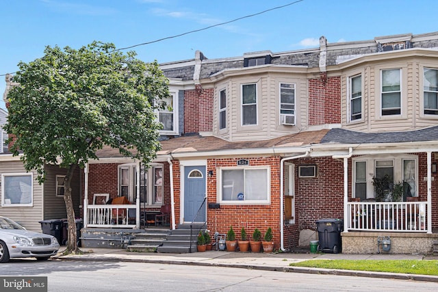 624 S Heald St, Wilmington, DE 19801 - multi unit property with a porch, brick siding, and a shingled roof