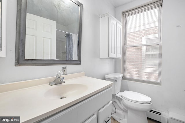 624 S Heald St, Wilmington, DE 19801 - bathroom with a baseboard radiator, vanity, plenty of natural light, and a shower with curtain