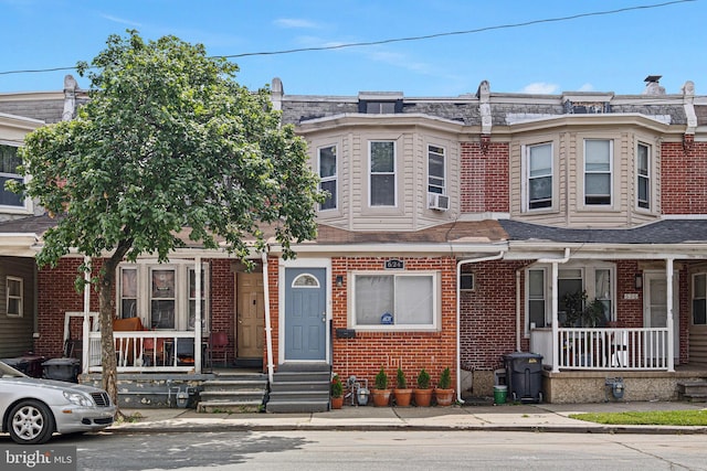 624 S Heald St, Wilmington, DE 19801 - multi unit property featuring a porch, brick siding, and cooling unit
