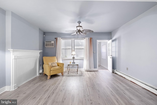 624 S Heald St, Wilmington, DE 19801 - sitting room with a baseboard heating unit, wood finished floors, a ceiling fan, and a wall mounted air conditioner