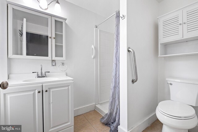 624 S Heald St, Wilmington, DE 19801 - full bath featuring vanity, tile patterned floors, and a tile shower