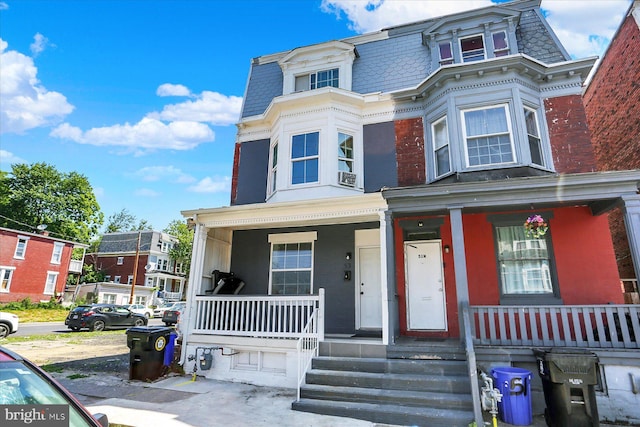 53 N 18th St, Harrisburg, PA 17103 - victorian home featuring mansard roof and a porch