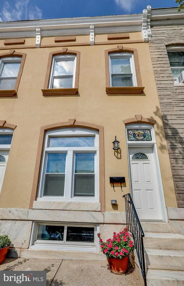 430 N Milton Ave, Baltimore, MD 21224 - view of front of house with stucco siding